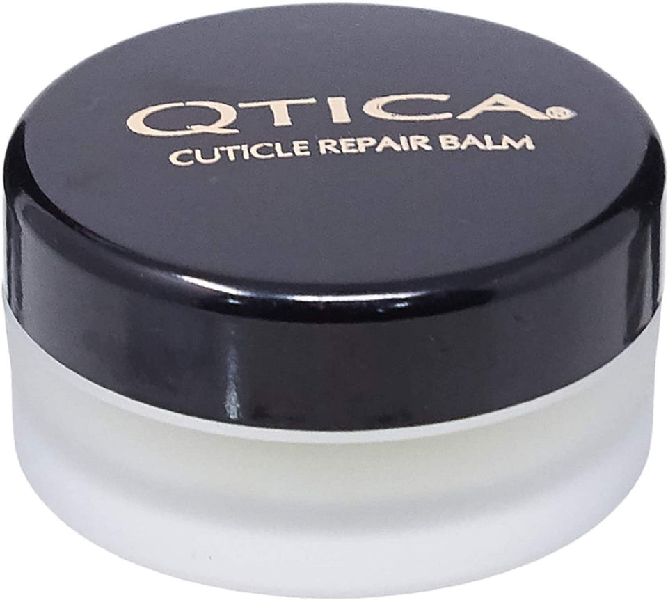 QTICA front view of balm tin showing label and compact size, easy travel repair