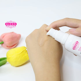 QUEEN NEW YORK label close-up highlighting active ingredients for targeted brightening