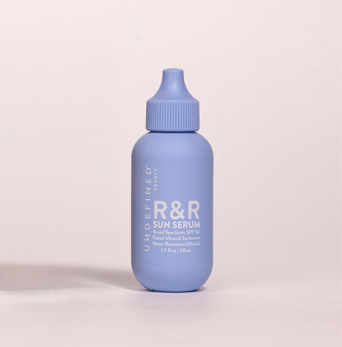 R&R sun serum pump top detail illustrating easy, mess-free dispensing benefit
