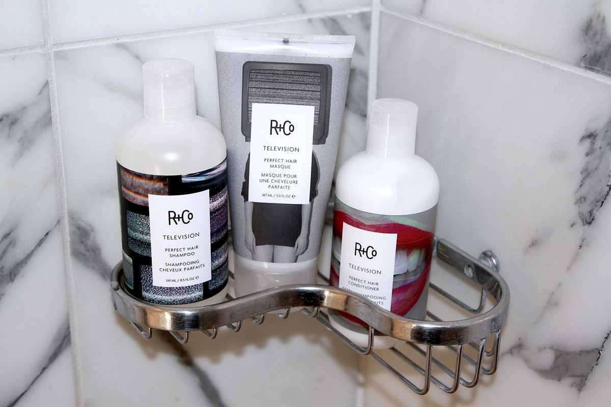 R+Co TELEVISION on a bathroom shelf in lifestyle setting showing salon results at home