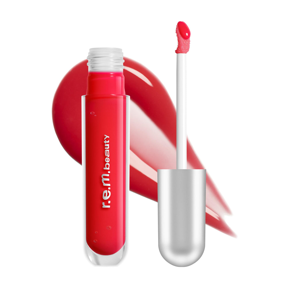 r.e.m. beauty front tube showing Shirley shade and glossy finish benefit