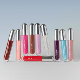 r.e.m. beauty fembot beside a coin to show compact travel-friendly size
