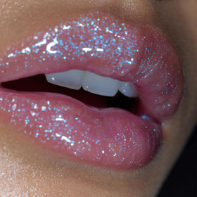 r.e.m. beauty fembot swatch on hand showing tint intensity and hydration