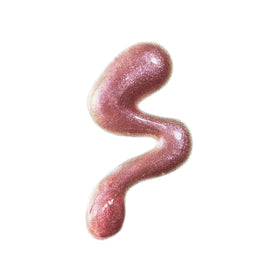 r.e.m. beauty gloss applicator closeup demonstrating smooth wand for precise application