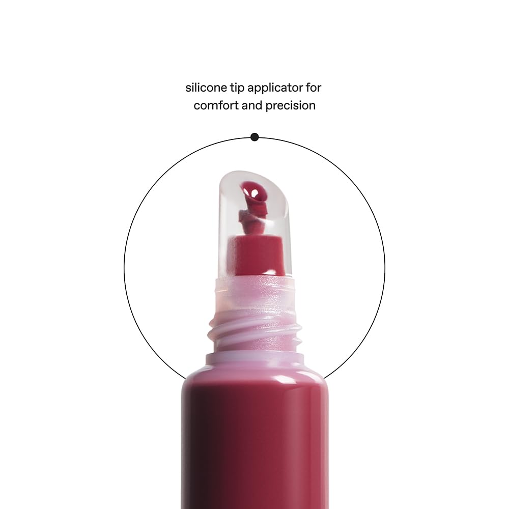 r.e.m. beauty gloss on vanity scene suggesting everyday wearable benefit