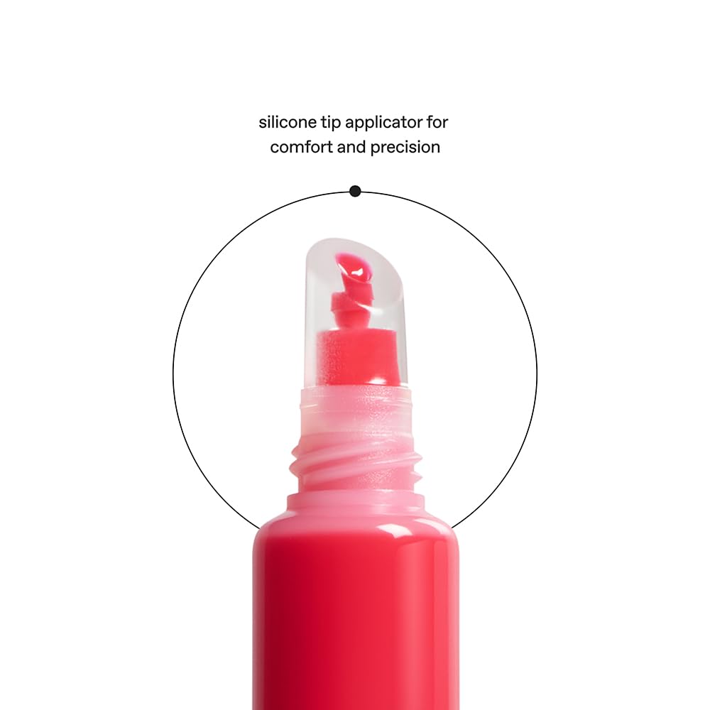 r.e.m. beauty lifestyle model outdoors wearing Poppy Punch for bold, ready-to-wear color