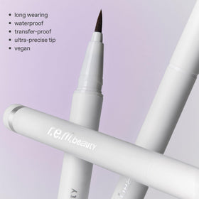 r.e.m. beauty Teddy liner held in hand showing size and travel-friendly scale