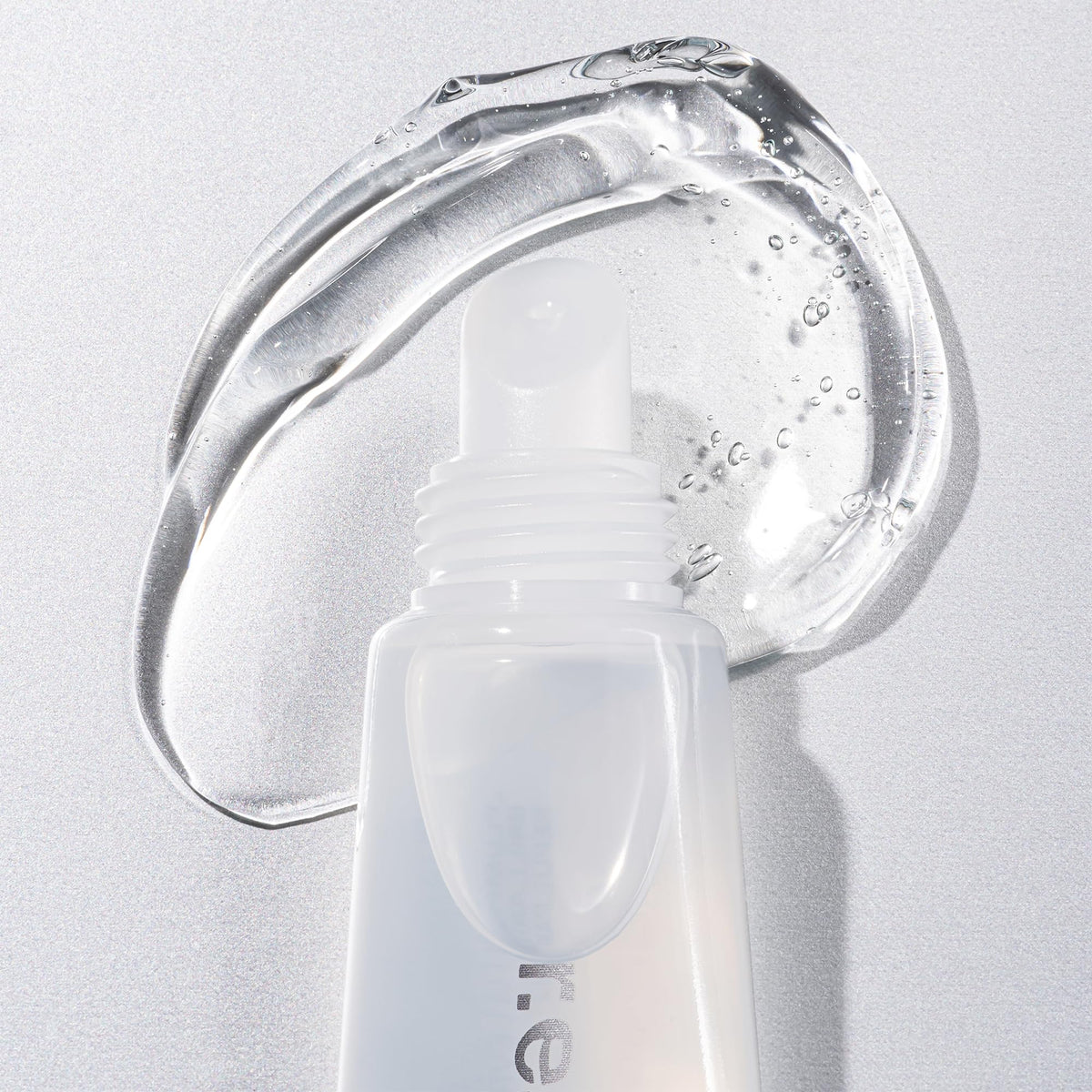 r.e.m. beauty glideable jelly texture on fingertip showing hydrating finish