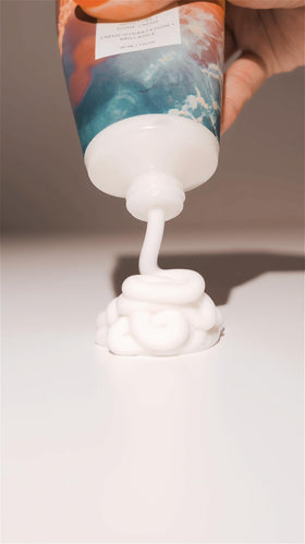R+Co HIGH DIVE on a bathroom vanity styled scene suggesting everyday salon-quality results