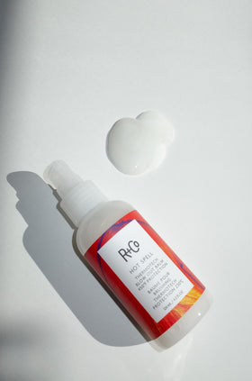 R+Co Hot Spell balm texture closeup illustrating creamy transformation and smooth application