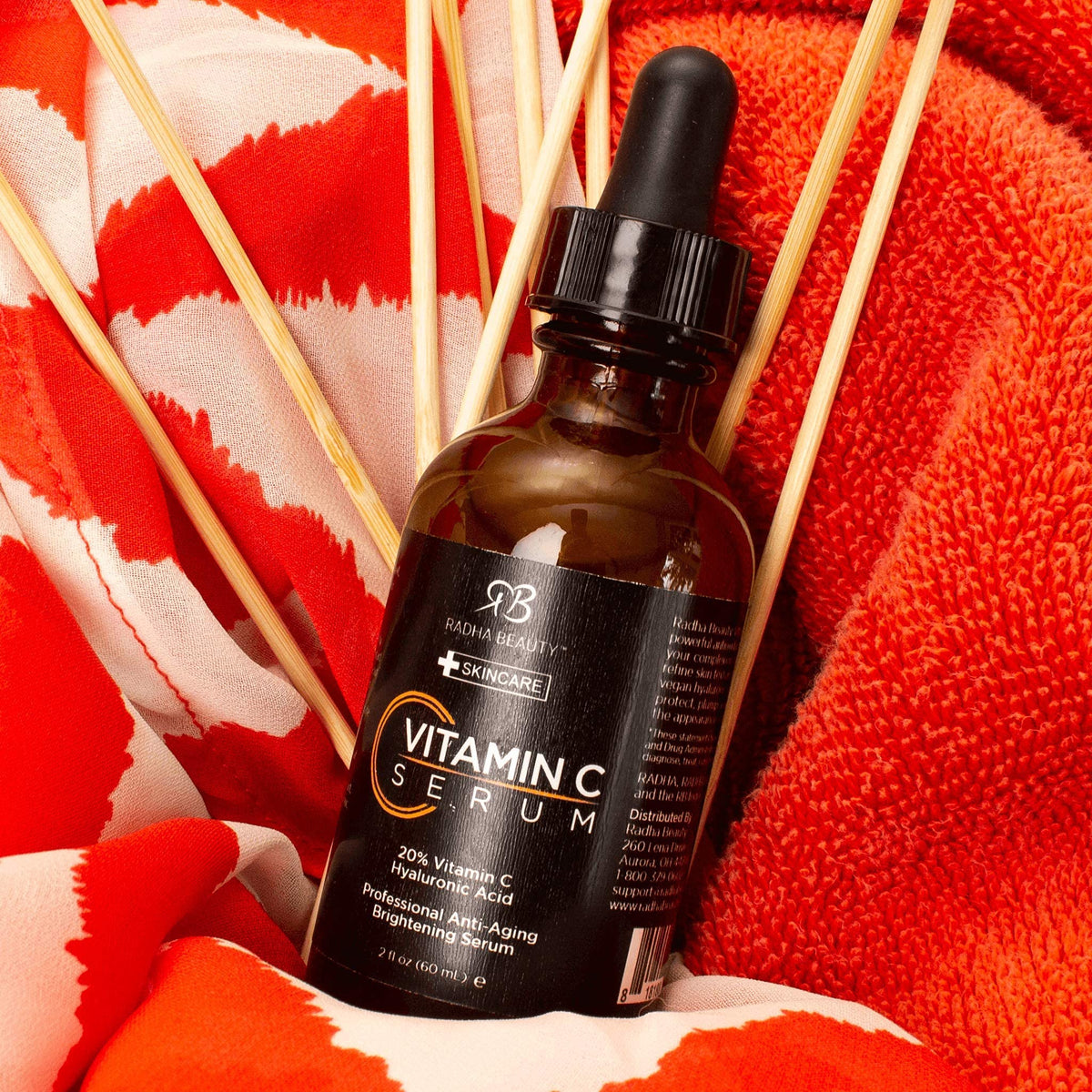 Radha Beauty applying serum to cheek for smoother, more radiant-looking skin