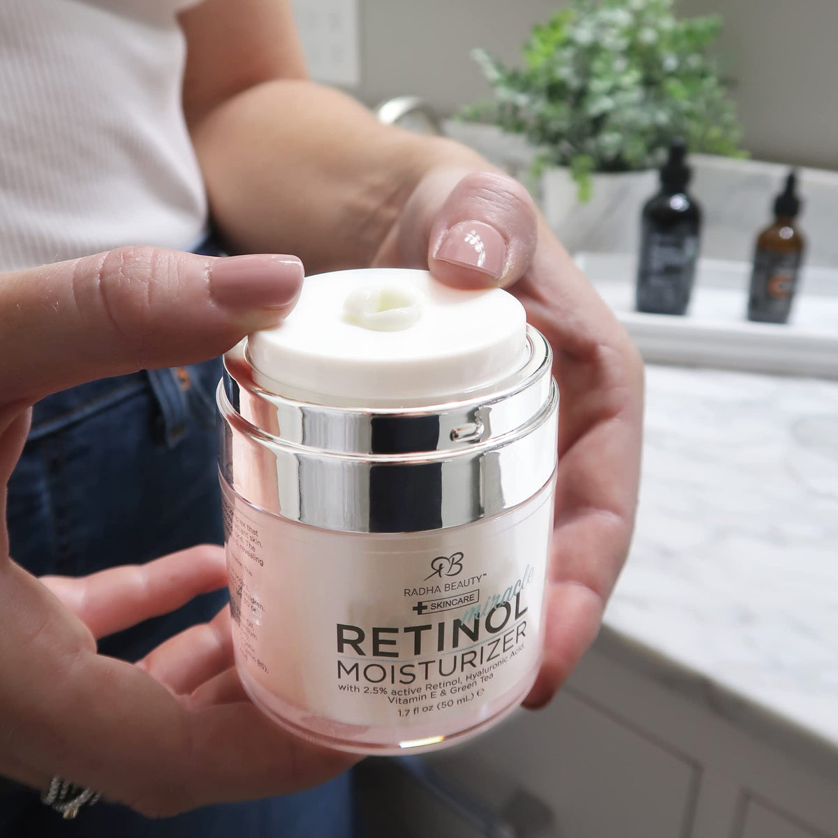Radha Beauty label close-up listing retinol hyaluronic acid vitamin E benefits