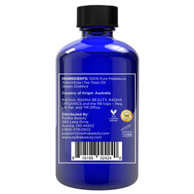 Radha Beauty dropper dispensing tea tree oil shows precision and control