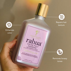 Rahua shampoo texture pouring from bottle highlighting creamy, nourishing formula