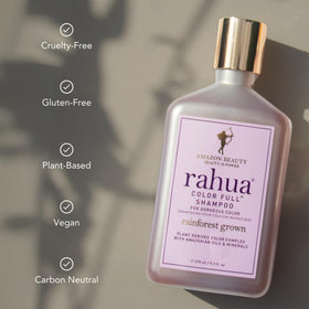 Rahua bottle beside common object to show 9.3 fl oz scale for purchase clarity