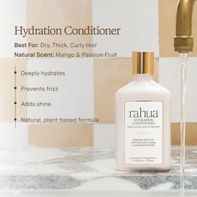 Rahua creamy conditioner texture on hand demonstrating rich slip and hydration