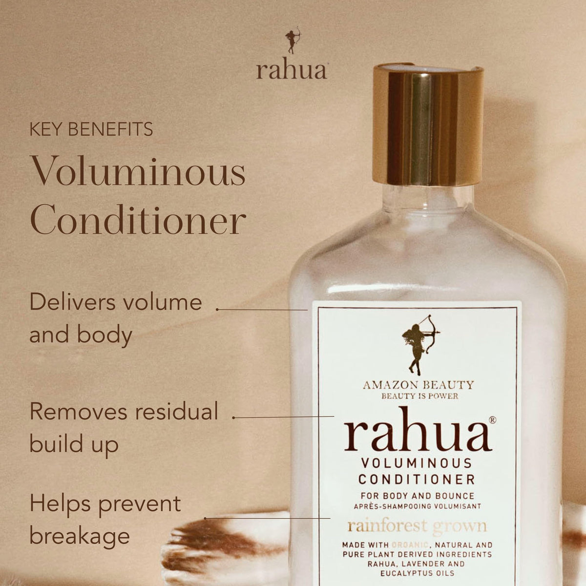 Rahua conditioner texture on palm demonstrating lightweight spreadability