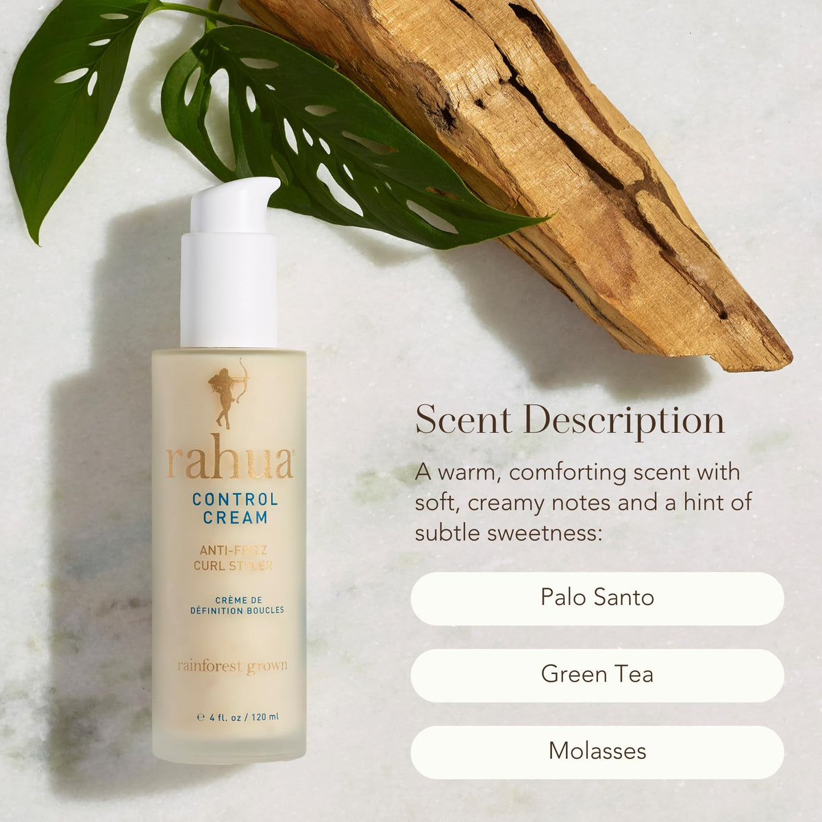 Applying Rahua control cream through curls with fingers for defined separation