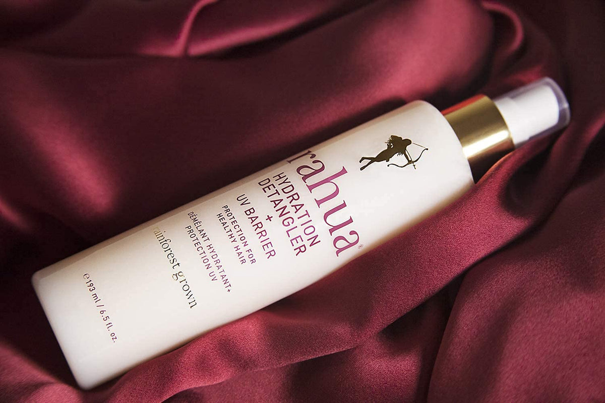 Rahua detangler lifestyle at beach illustrating sun protection and humidity control