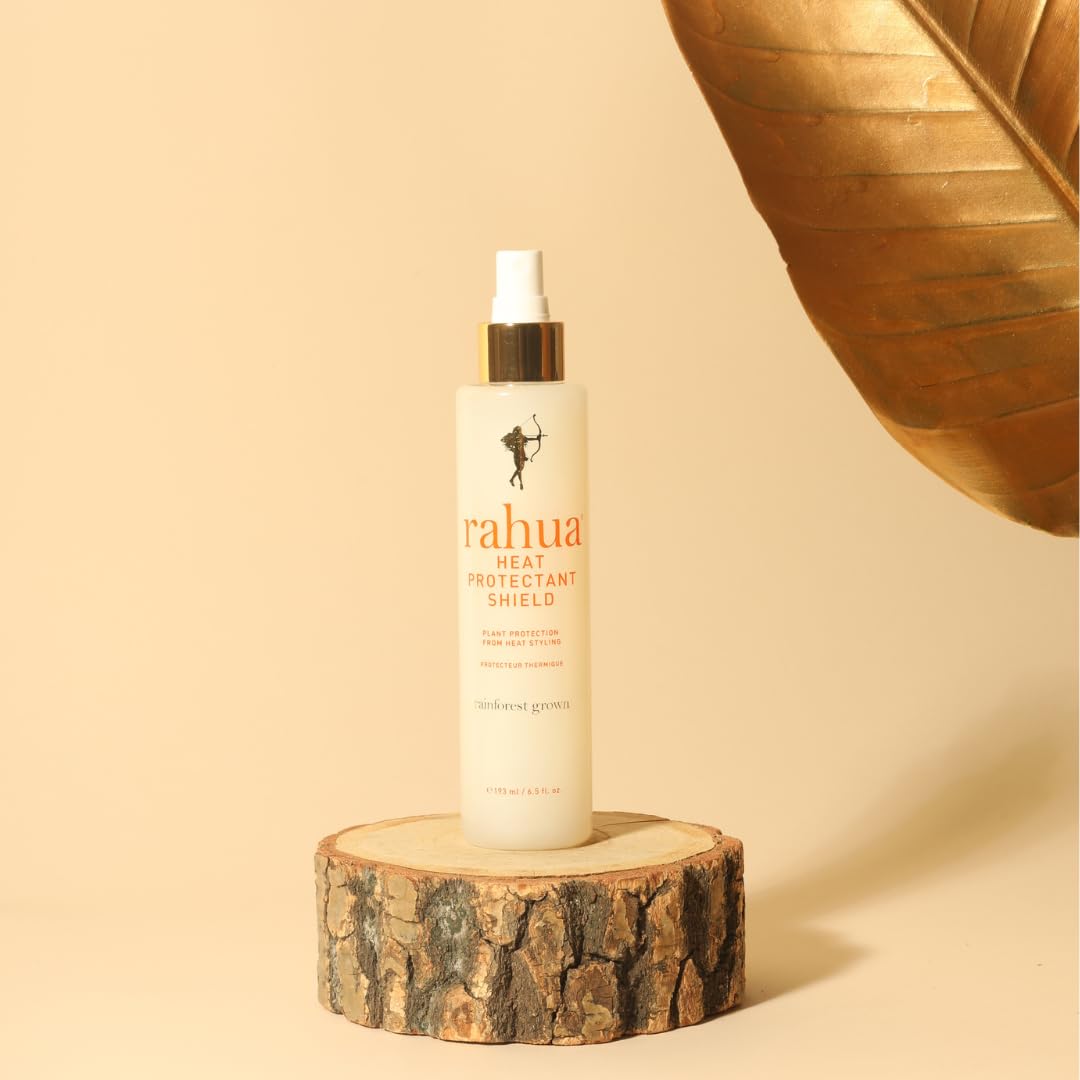 Rahua being applied to damp hair demonstrating easy, even protection before heat