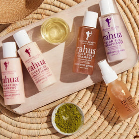 Rahua shampoo lather in shower demonstrating gentle cleansing and frizz control