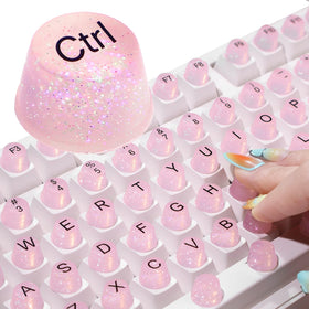 Raised Button front packaging showing pink glitter silicone keycaps and set count