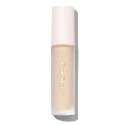 Rare Beauty Always An Optimist front packaging showing tube and label, brightens shadow payoff