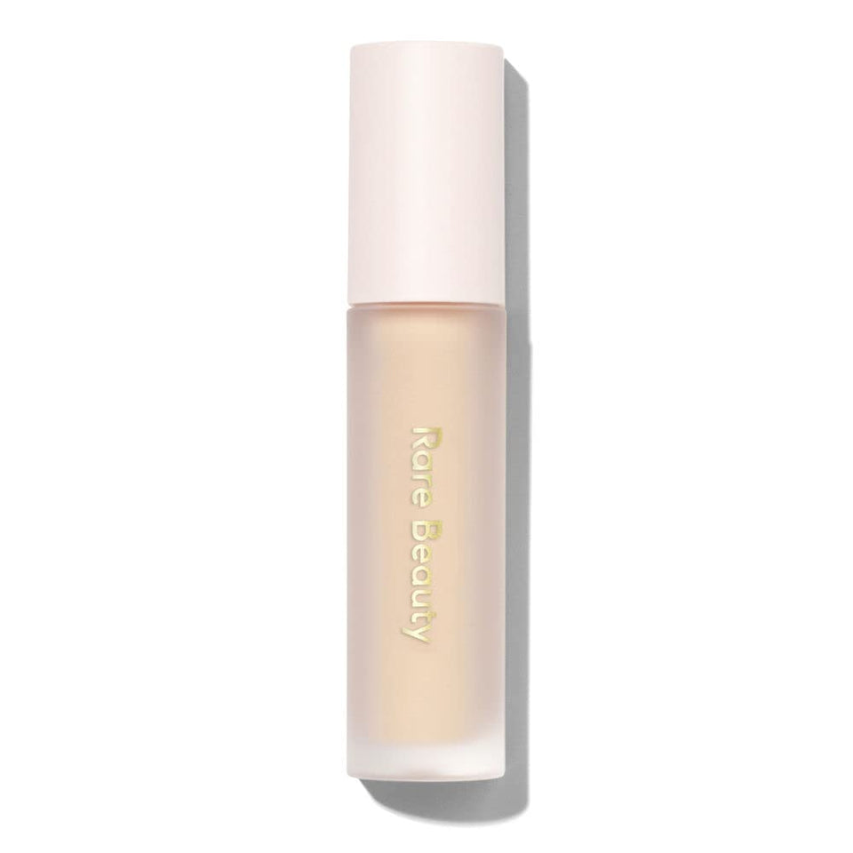 Rare Beauty Always An Optimist front packaging showing tube and label, brightens shadow payoff
