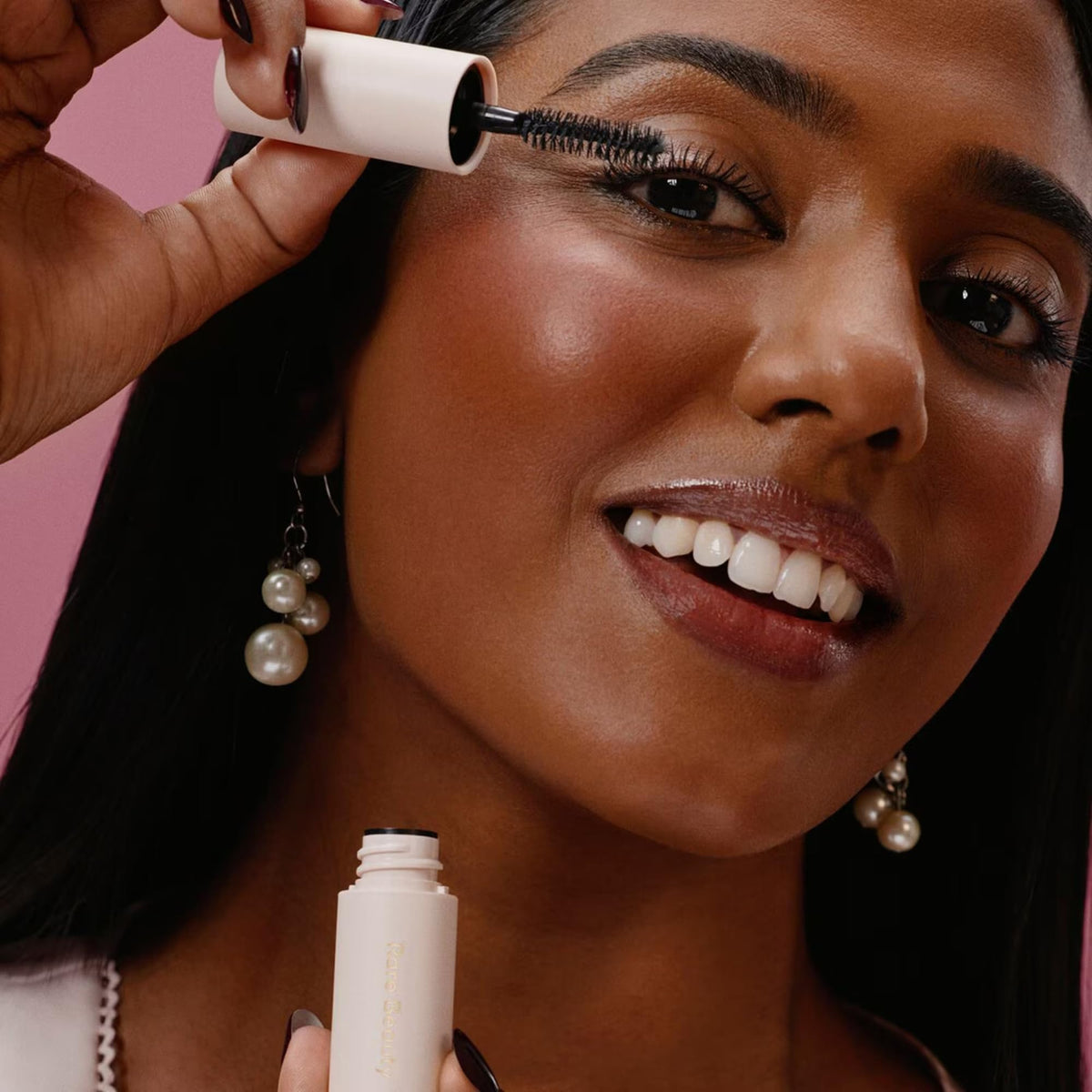 Rare Beauty clear brow gel spoolie detail showing lift and natural laminated finish