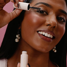 Rare Beauty clear brow gel spoolie detail showing lift and natural laminated finish