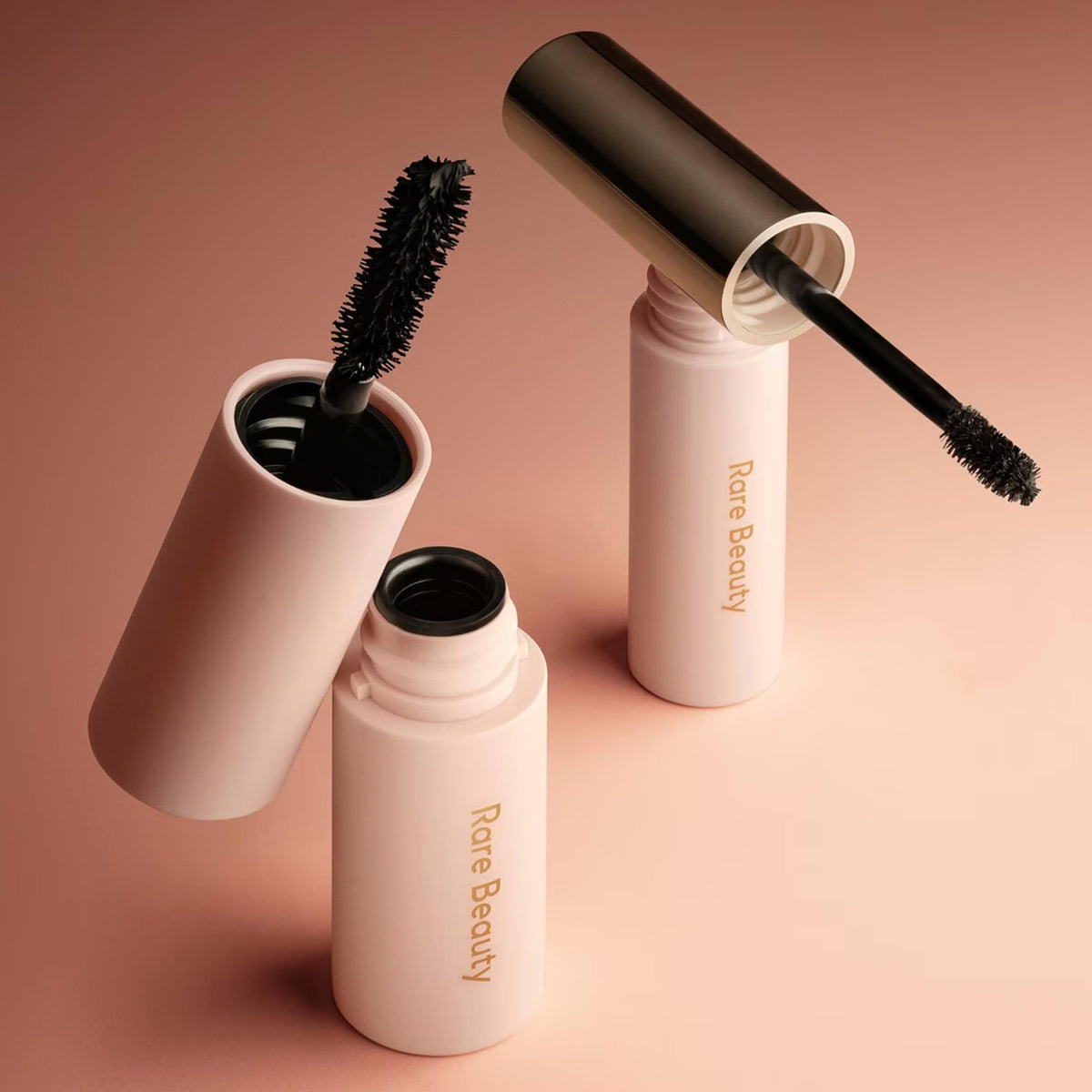 Rare Beauty lifestyle image of model wearing the mascara and brow gel for polished eyes