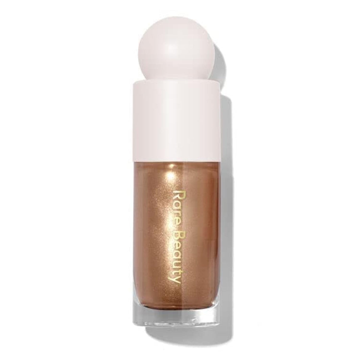 Rare Beauty bottle front view showing sleek packaging and luminous finish benefit