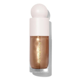 Rare Beauty bottle front view showing sleek packaging and luminous finish benefit