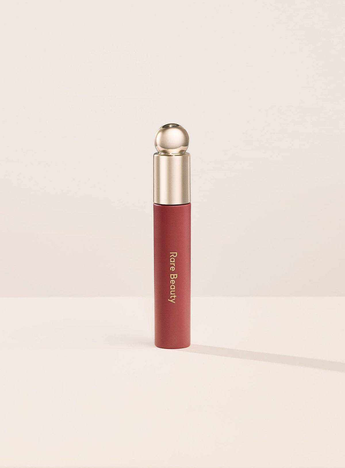Rare Beauty Soft Pinch front packaging showing tube and shade, highlights moisturizing benefits