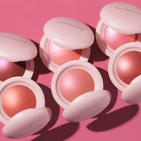 Rare Beauty model wearing Cheer on cheeks showing natural radiant finish and warmth