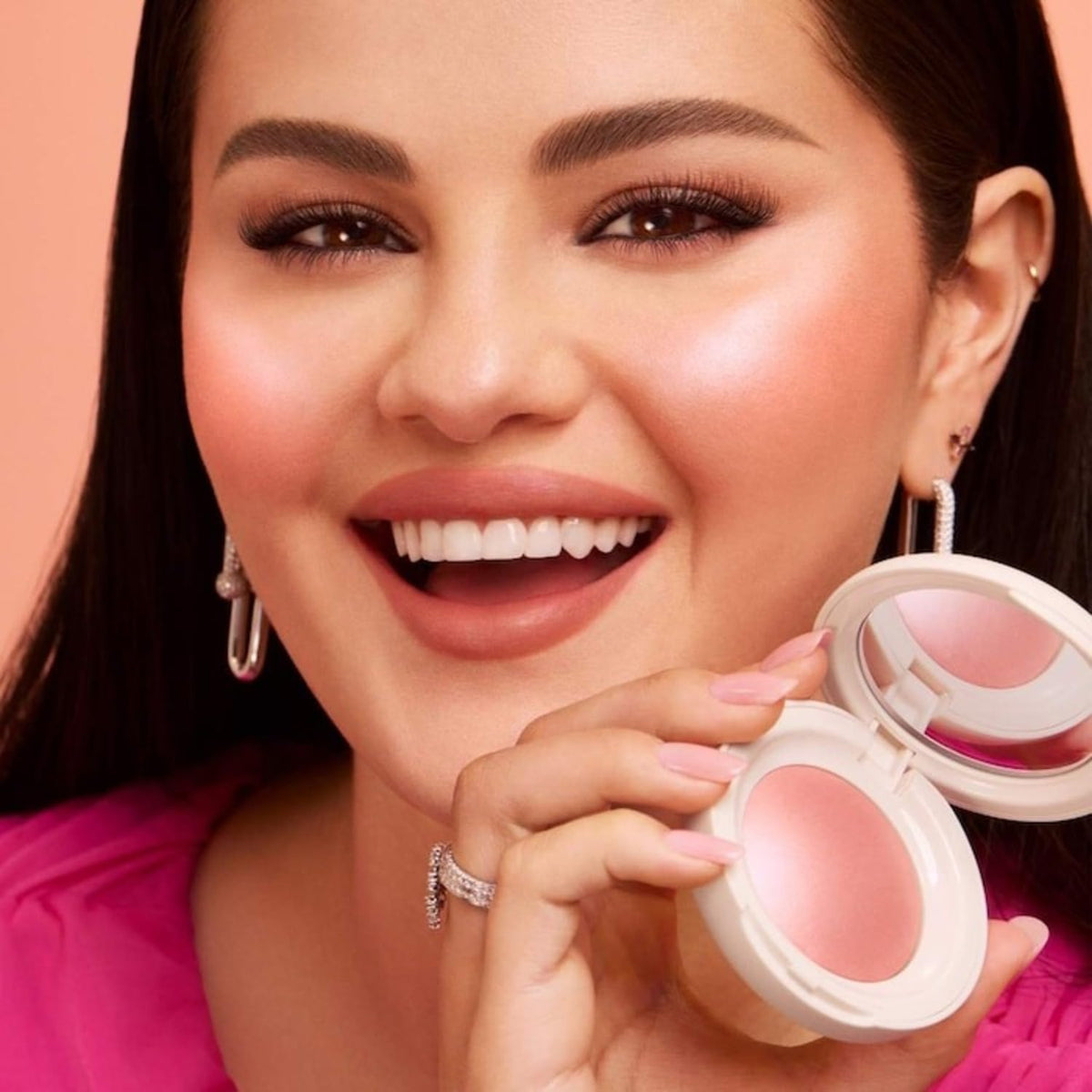 Rare Beauty close-up of silky powder texture highlighting smooth blendability and glow