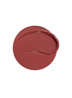 Rare Beauty Soft Pinch texture close-up on applicator, reveals glossy non-sticky finish