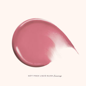 Rare Beauty swatch of Encourage on arm showing buildable, natural-pink payoff for reference