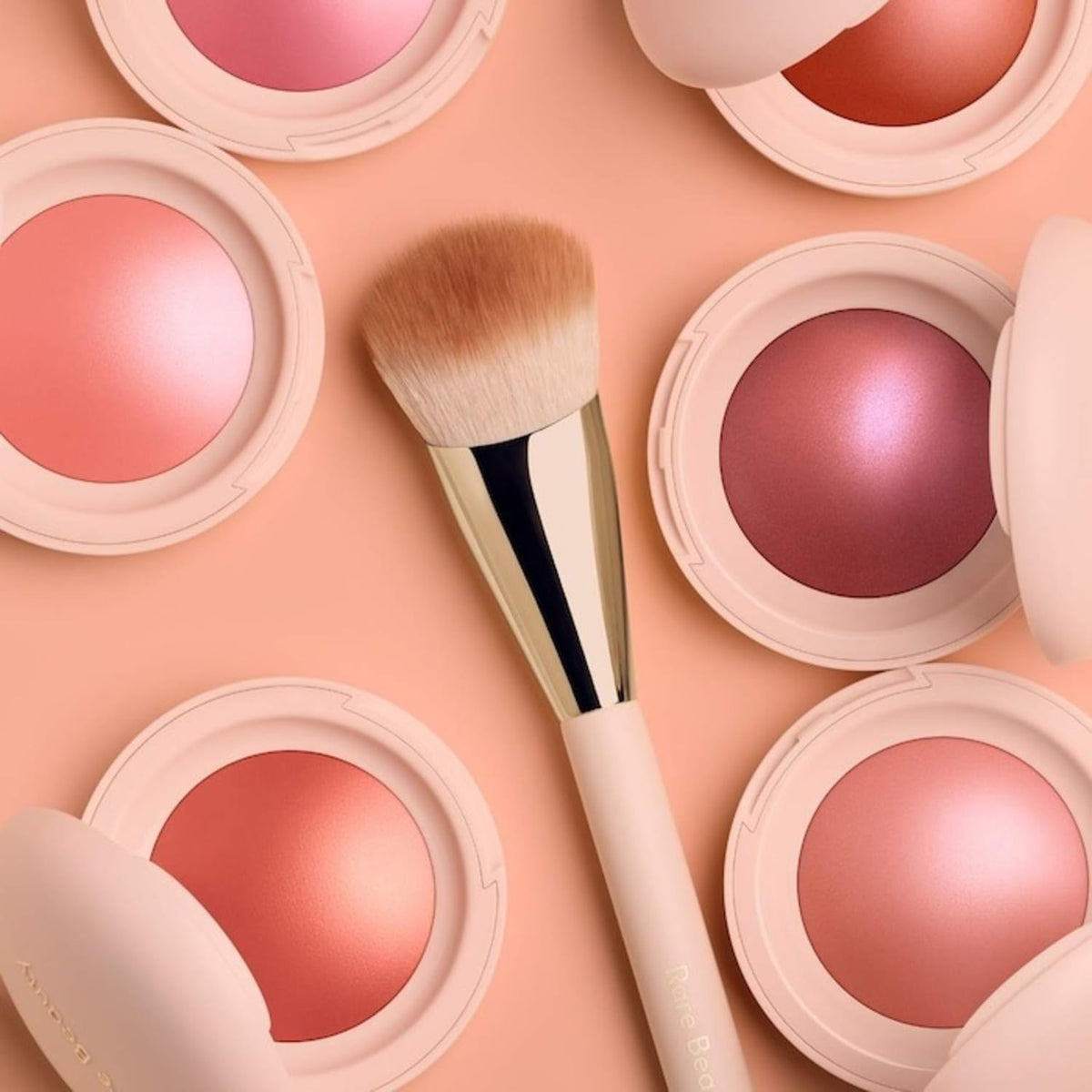 Rare Beauty on a vanity with mirror highlighting everyday makeup use