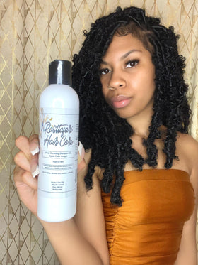 Rasttafari Hair Care bottle side view with pump, highlighting packaging usability