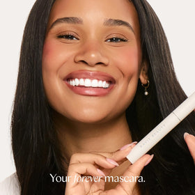 Ravie Beauty removing mascara with warm water showing gentle removal