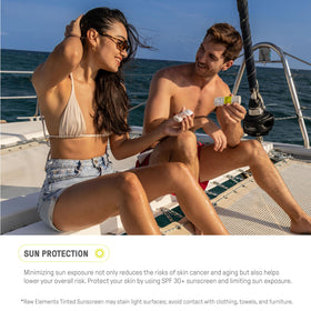 Raw Elements lifestyle on beach demonstrating reef-friendly sun protection benefit