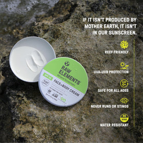 Raw Elements open tin top view revealing solid zinc-oxide balm for face and body