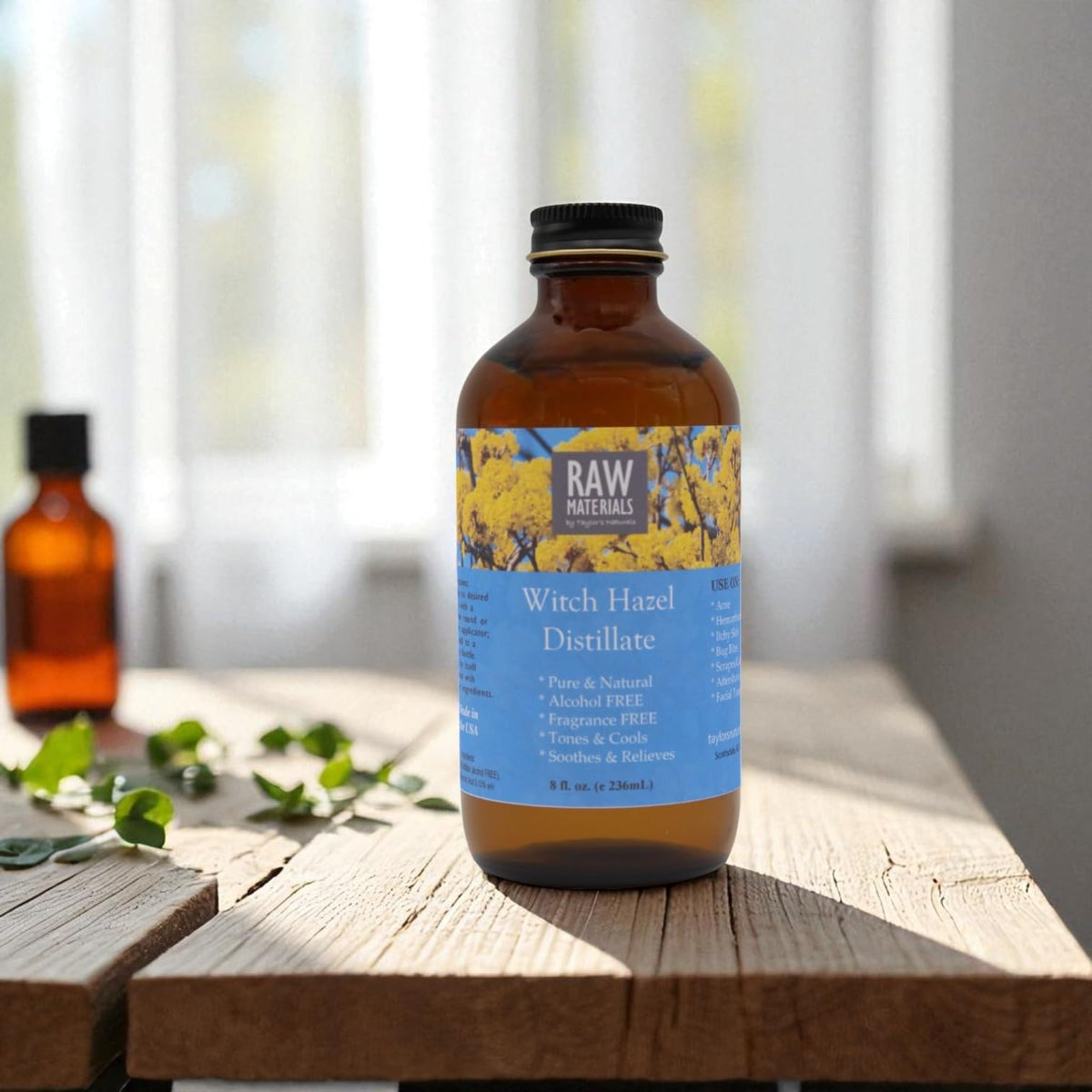 RAW MATERIALS bottle held in hand showing size and portability for travel and everyday use