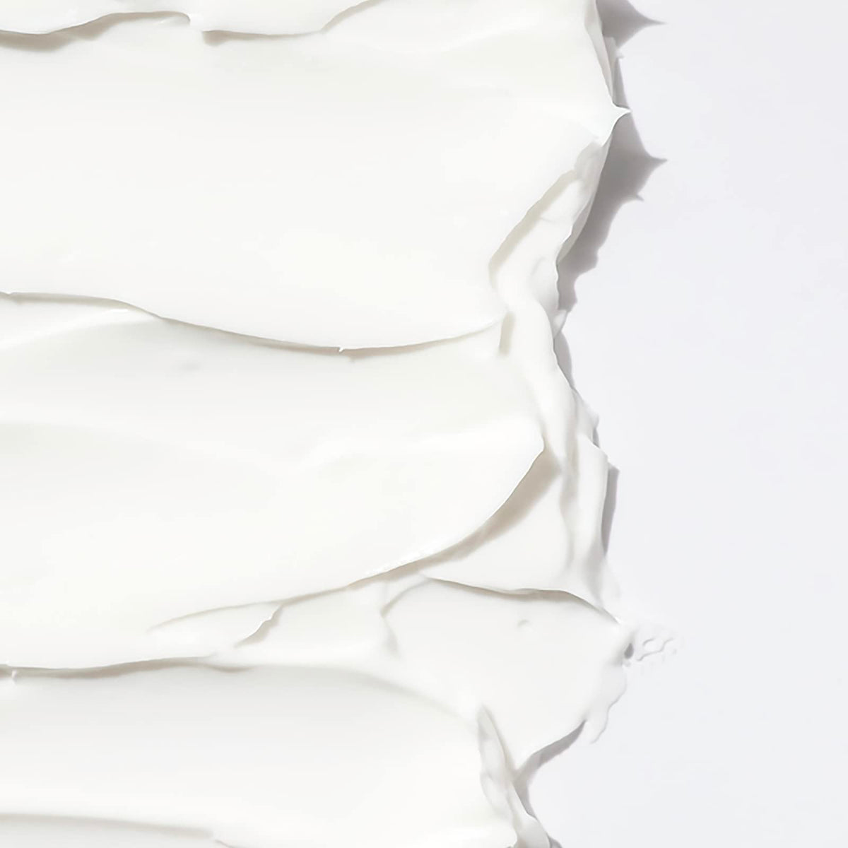 RAW SUGAR applied to wet hair demonstrating detangling and smoothing benefit