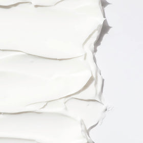 RAW SUGAR applied to wet hair demonstrating detangling and smoothing benefit