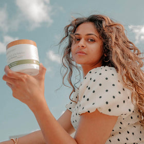 RAW SUGAR jar held in hand showing 12 oz size and travel-friendly scale