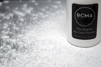 RCMA Makeup powder texture close-up revealing ultra-fine particles for smooth application and natural finish
