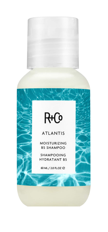 R+Co Atlantis front packaging showing 2 oz bottle and travel-ready benefit