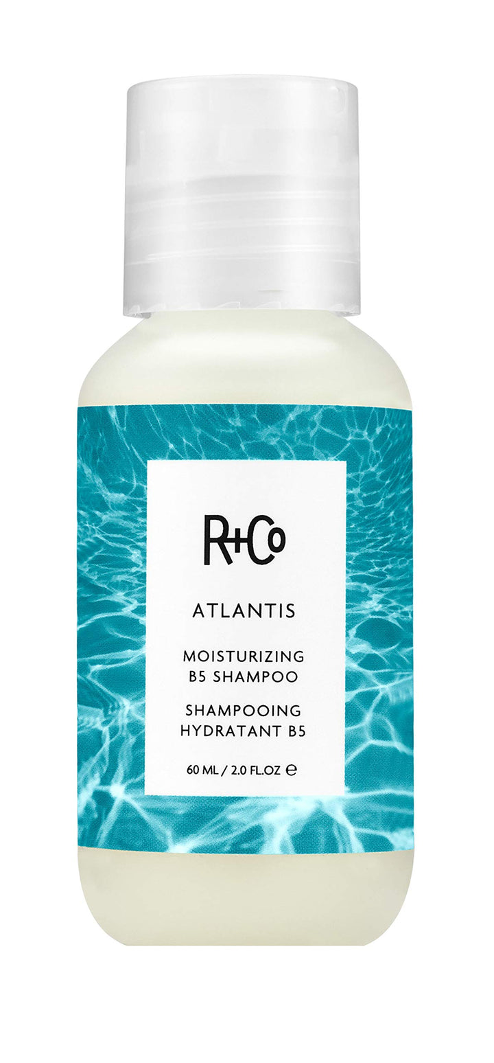 R+Co Atlantis front packaging showing 2 oz bottle and travel-ready benefit